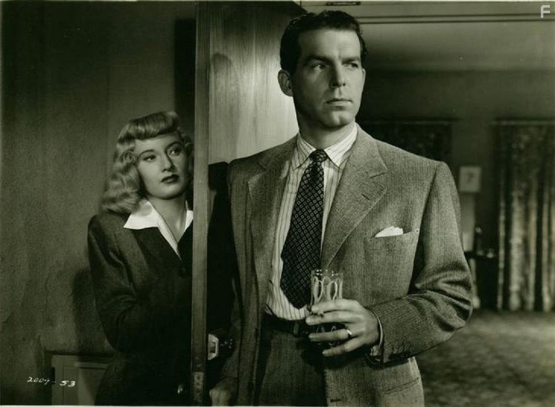 Barbara Stanwyck and Fred MacMurray in Двойная страховка (1944)