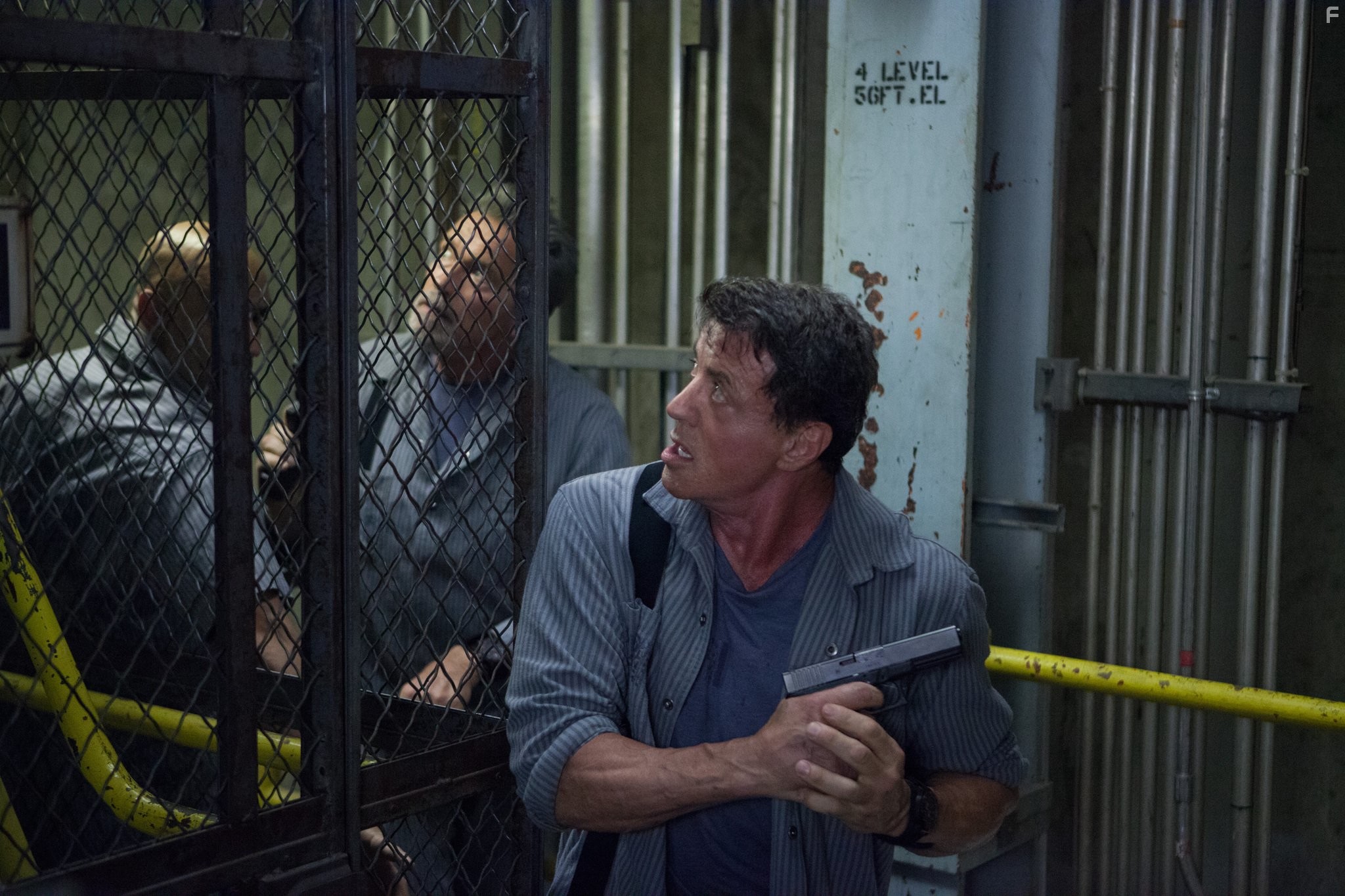 Arnold Schwarzenegger and Sylvester Stallone in План побега (2013)