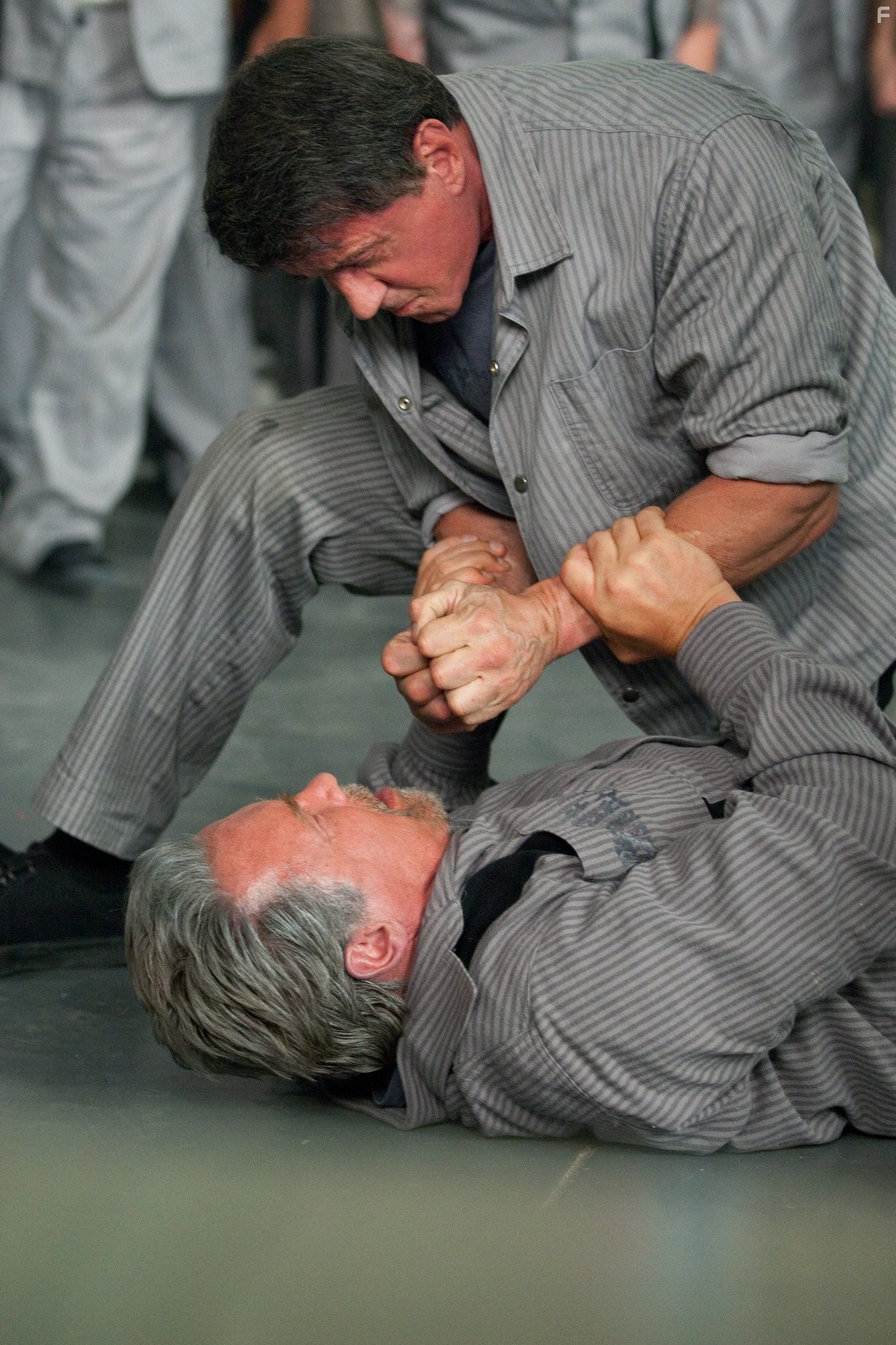 Arnold Schwarzenegger and Sylvester Stallone in План побега (2013)