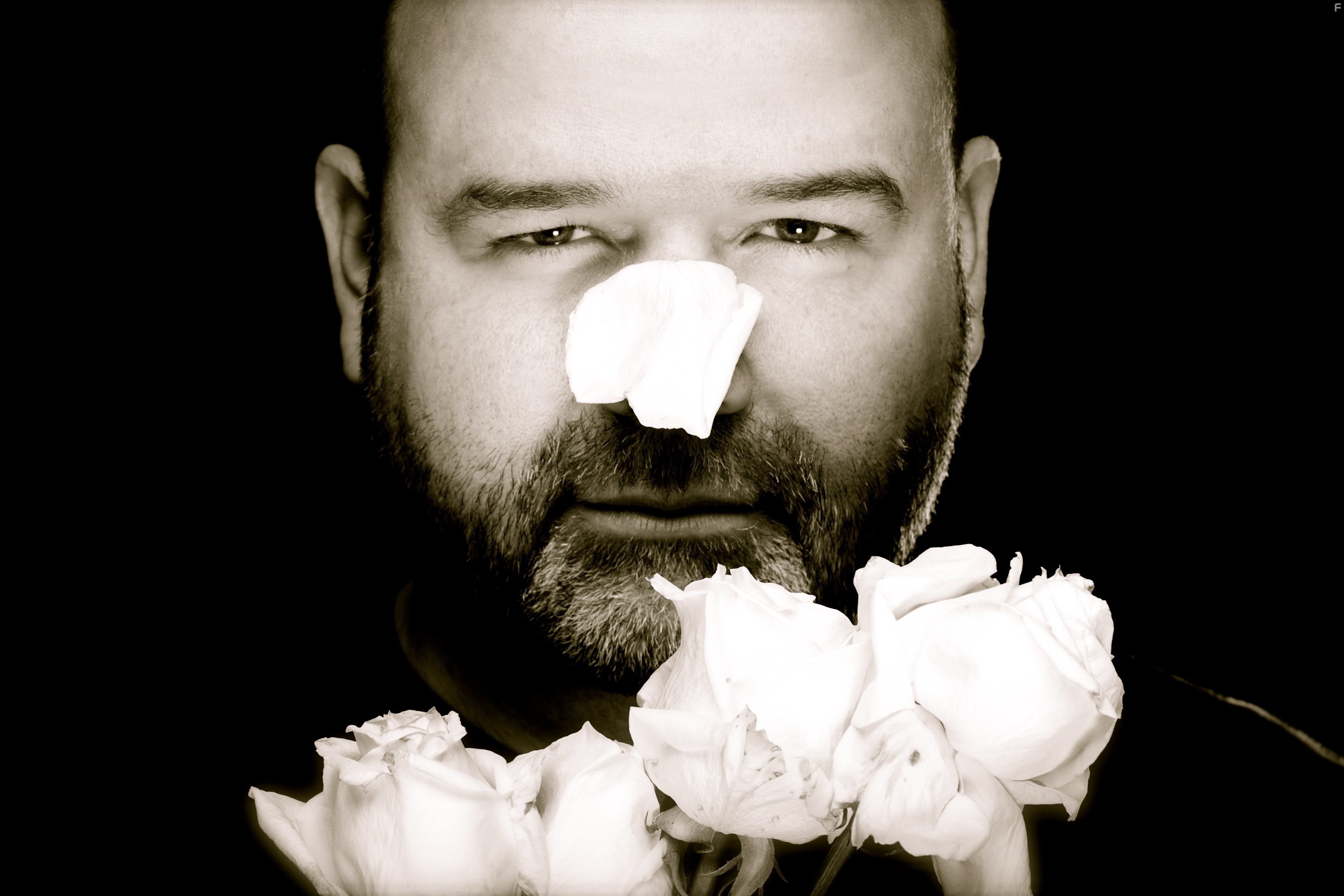 Thom Fitzgerald smells the roses on the set of Cloudburst