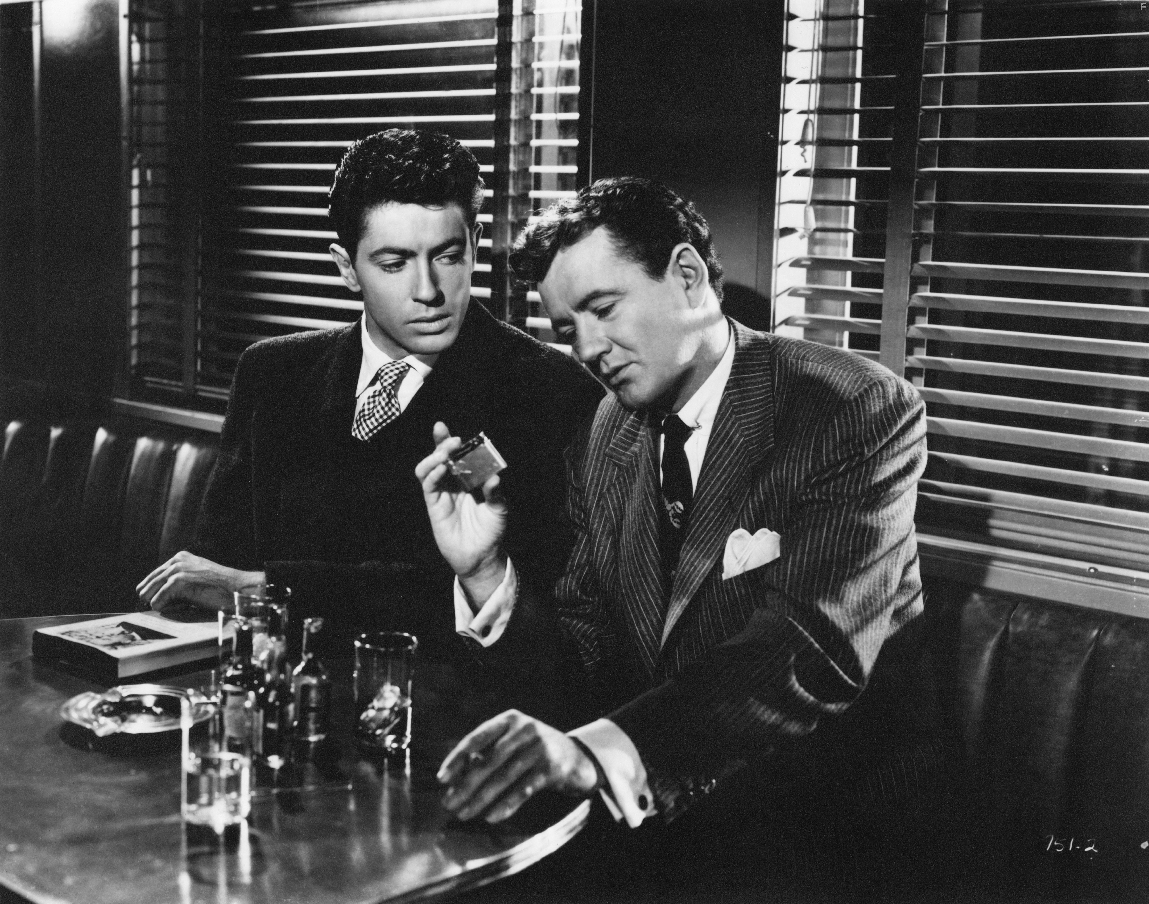 Farley Granger and Robert Walker in Незнакомцы в поезде (1951)