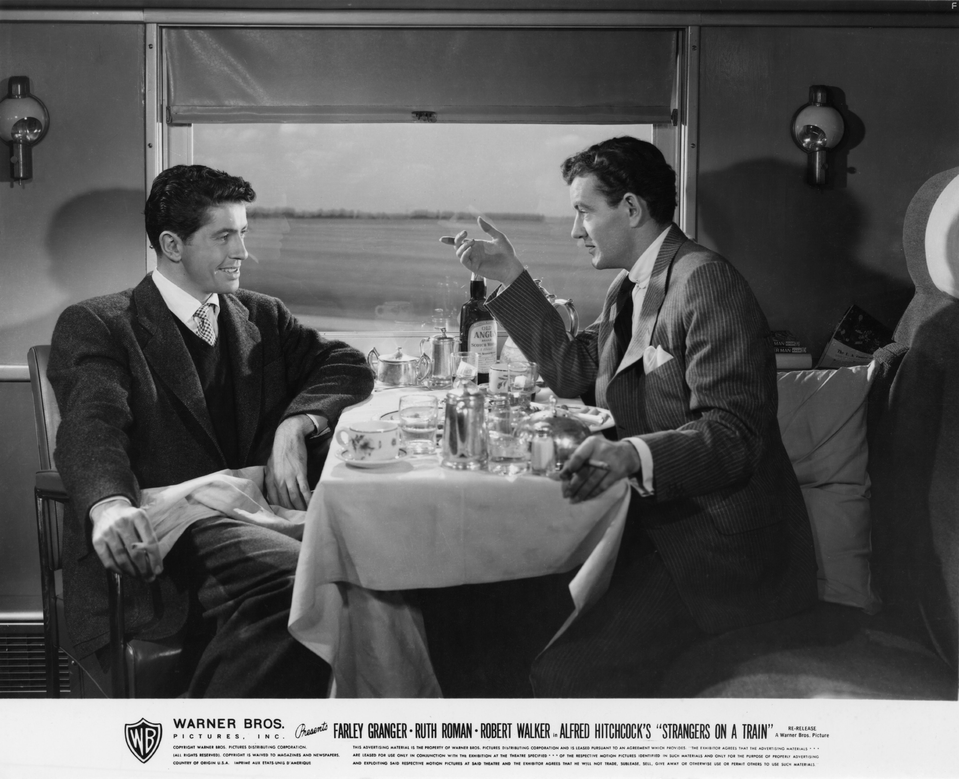 Farley Granger and Robert Walker in Незнакомцы в поезде (1951)