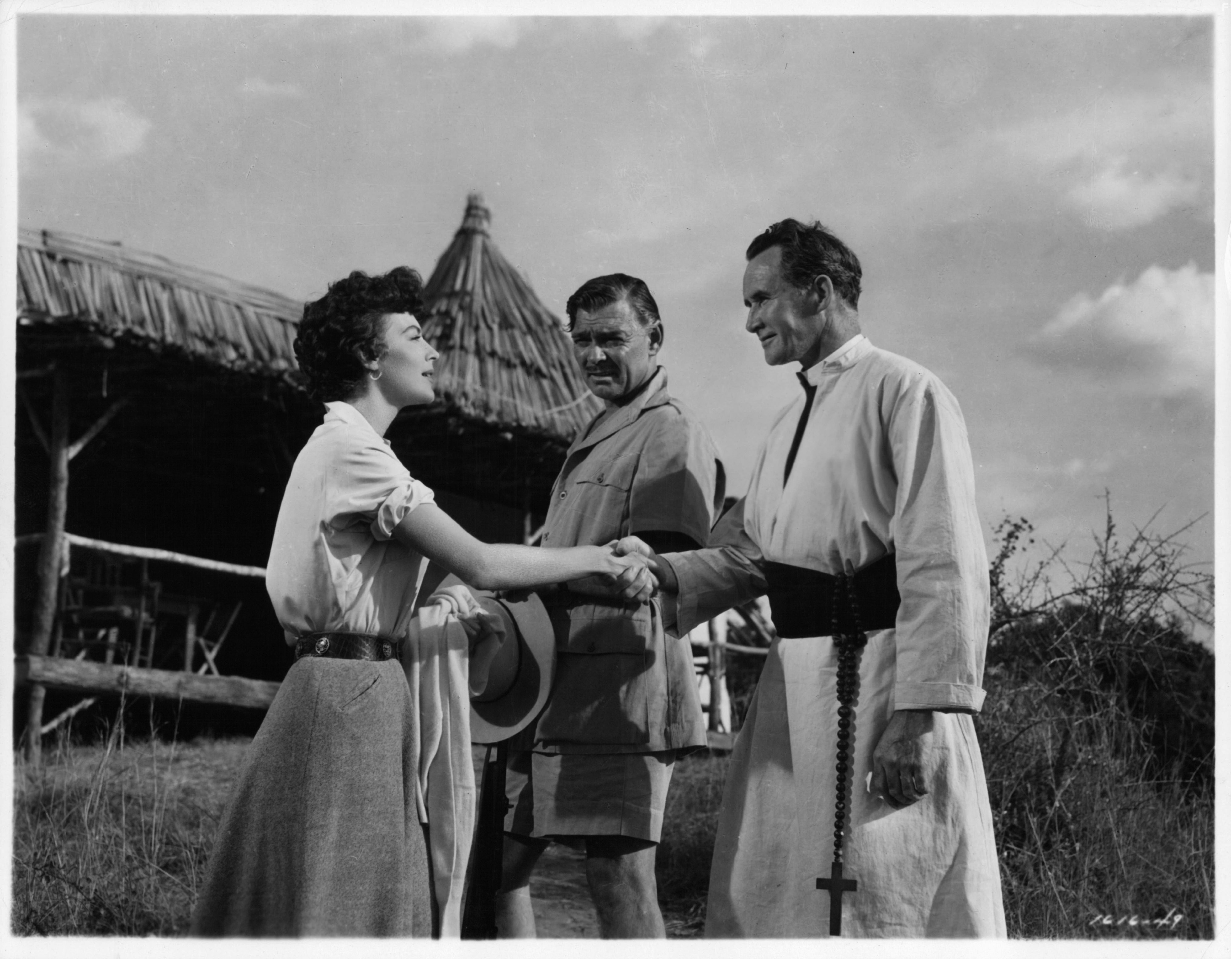 Clark Gable, Ava Gardner, and Denis O'Dea in Могамбо (1953)