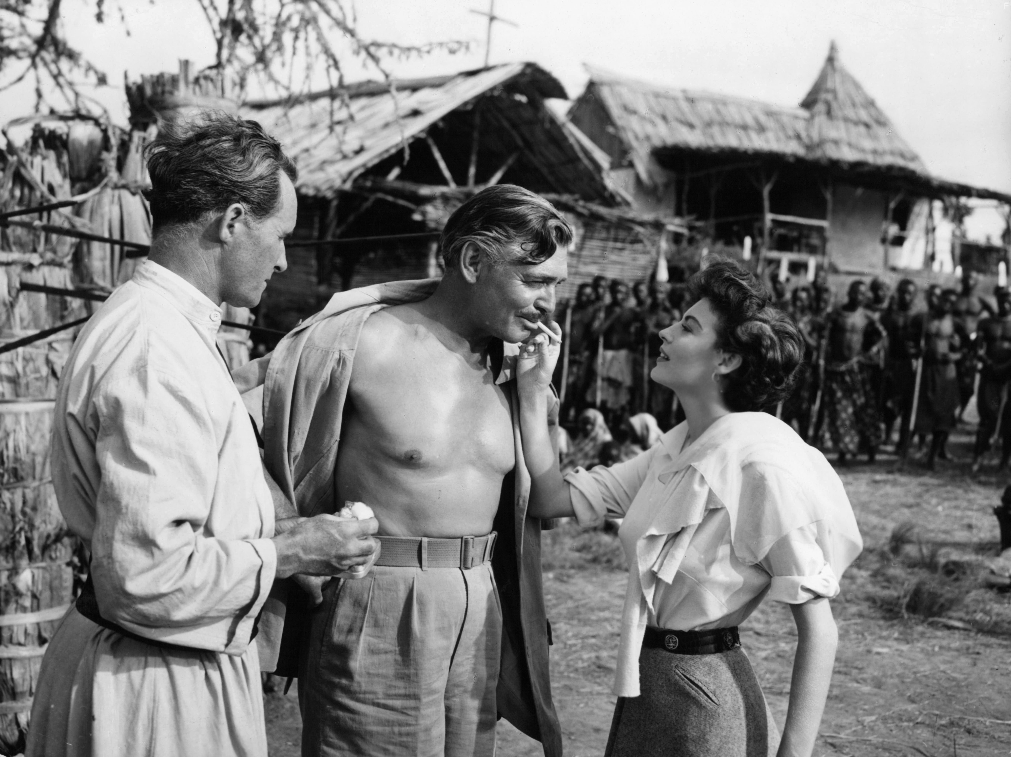 Clark Gable, Ava Gardner, and Denis O'Dea in Могамбо (1953)