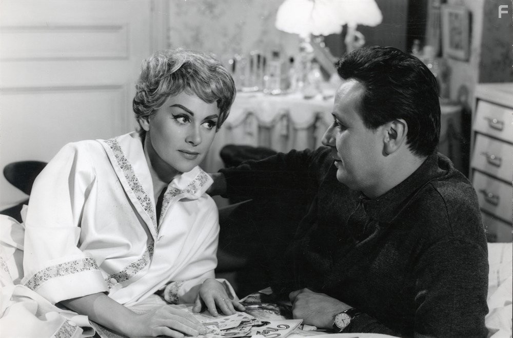 Maurice Biraud and Martine Carol in Le cave se rebiffe (1961)