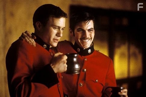 (Left to right) Heath Ledger as Harry and Wes Bentley as Durrance