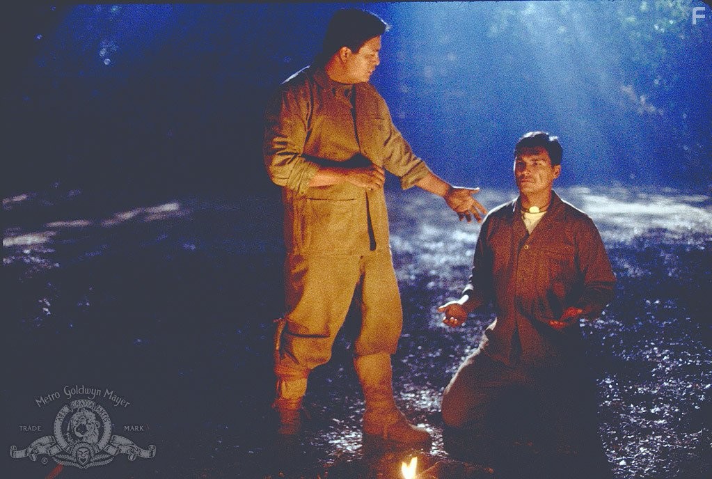 Adam Beach and Roger Willie in Говорящие с ветром (2002)