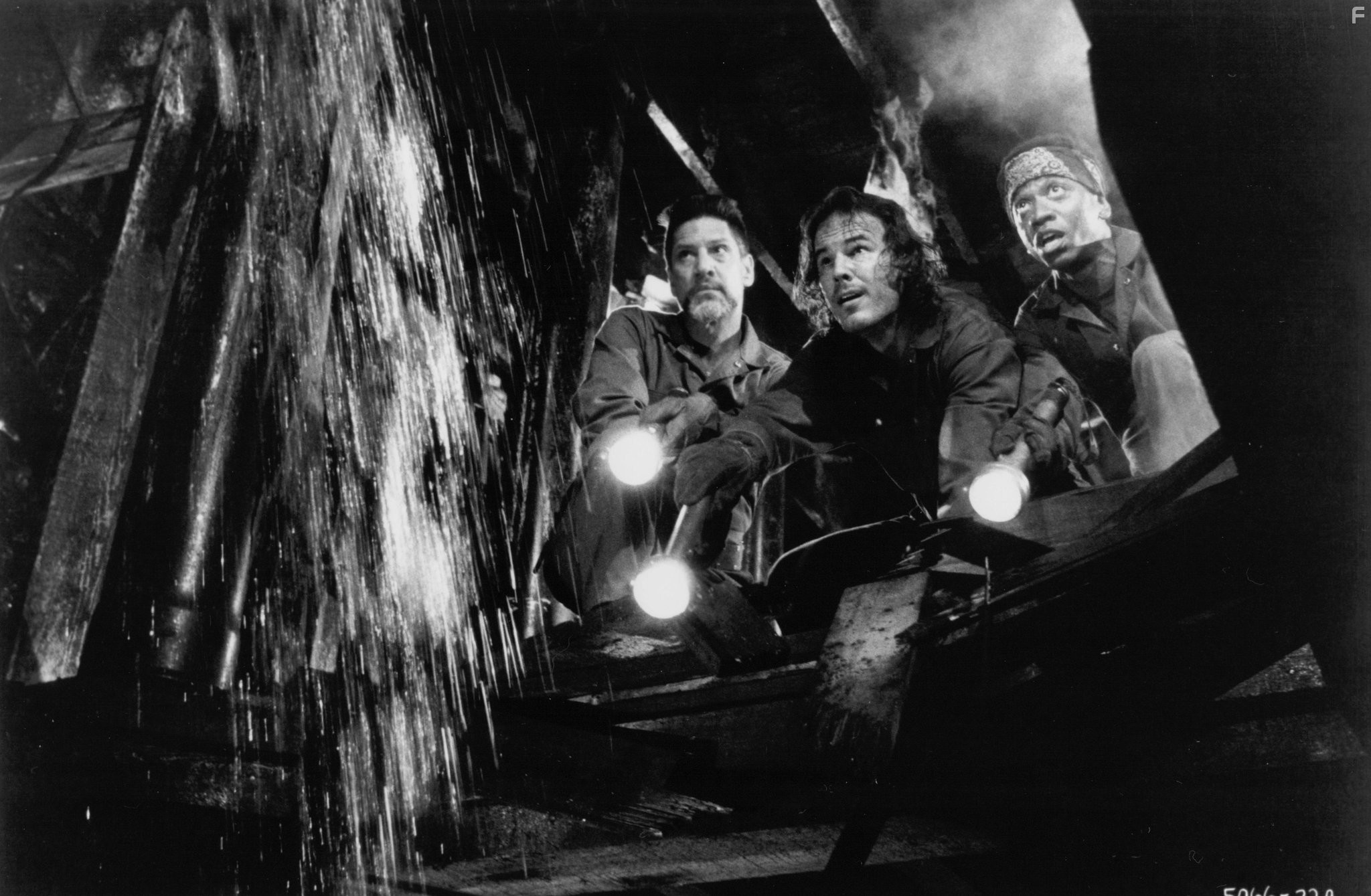 Brad Dourif, Andrew Divoff, and Stephen Macht in Ночная смена (1990)