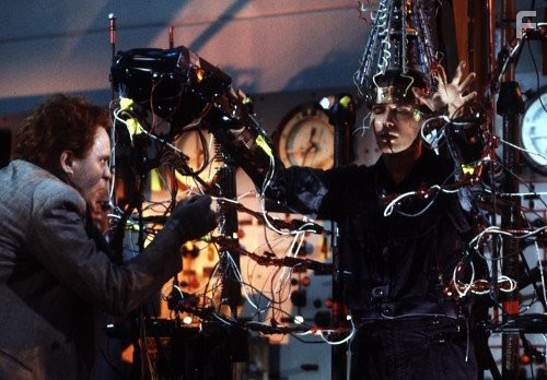 Peter Weller and John Lithgow in Приключения Бакару Банзая в восьмом измерении (1984)