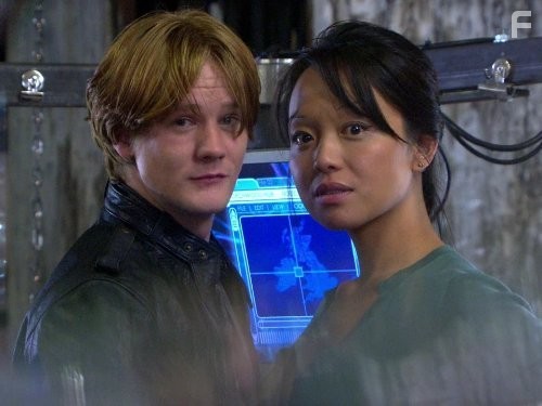 Bryan Dick and Naoko Mori in Торчвуд (2006)