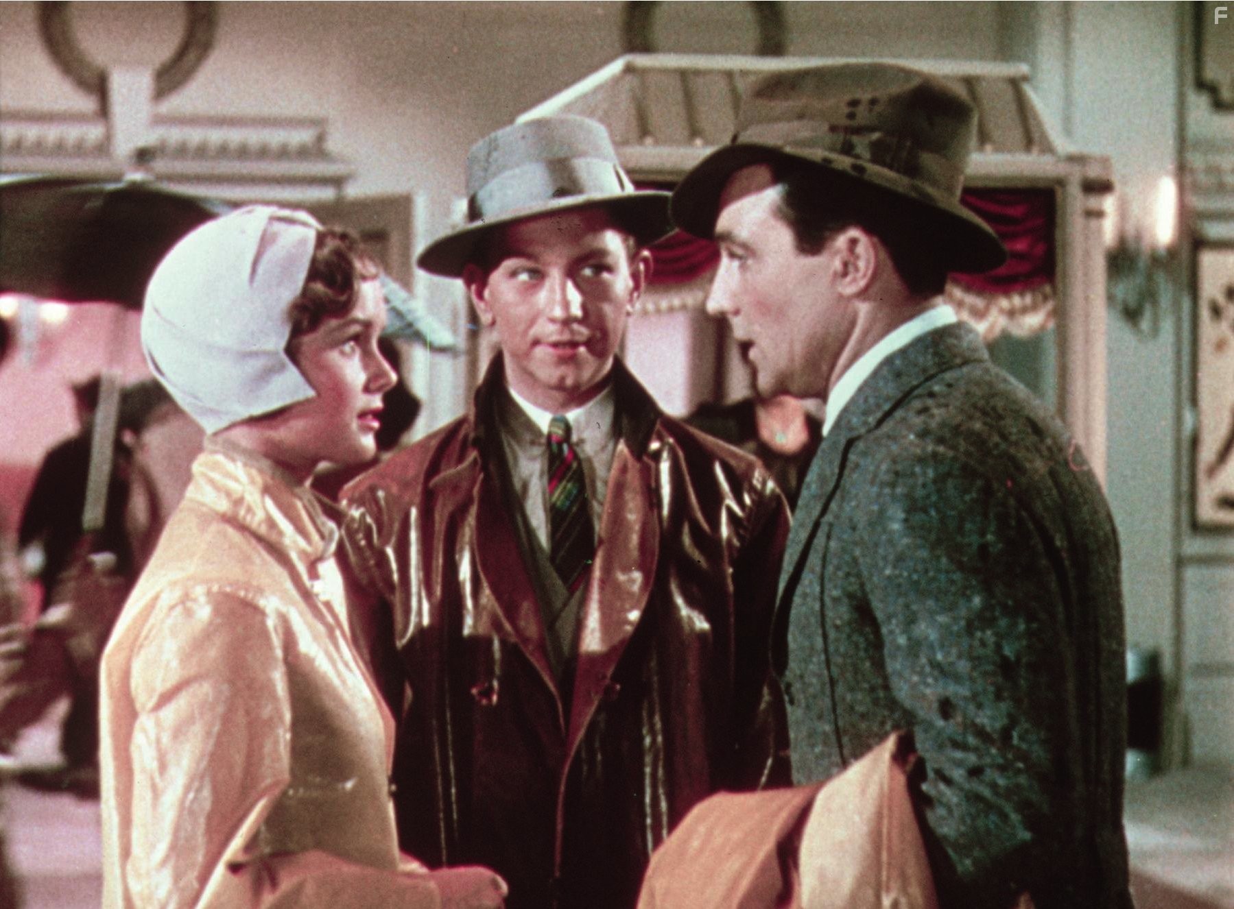 Gene Kelly, Debbie Reynolds, and Donald O'Connor in Поющие под дождём (1952)