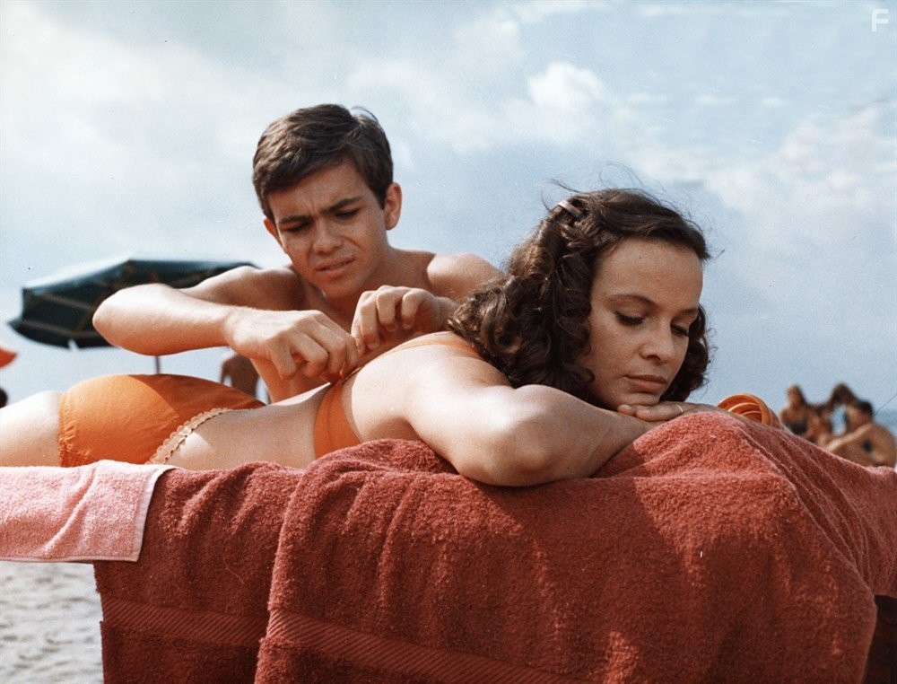 Laura Antonelli and Alessandro Momo in Peccato veniale (1974)