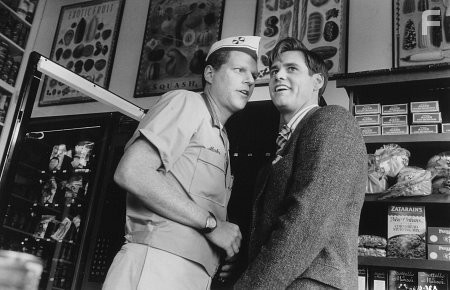 Jim Carrey and Noah Emmerich in Шоу Трумана (1998)