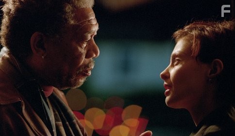 Grimes (MORGAN FREEMAN) passes along to Claire (ASHLEY JUDD) sensitive information about a top-secret military trial.