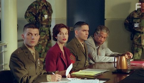 (l-r)  Military attorney Embry (ADAM SCOTT), lawyer Claire Kubik (ASHLEY JUDD), her defendant husband Tom (JIM CAVIEZEL) and "wild card" lawyer Grimes (MORGAN FREEMAN) await the start of a top-secret military trial.