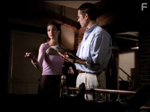 Charisma Carpenter and Alexis Denisof in Ангел (1999)
