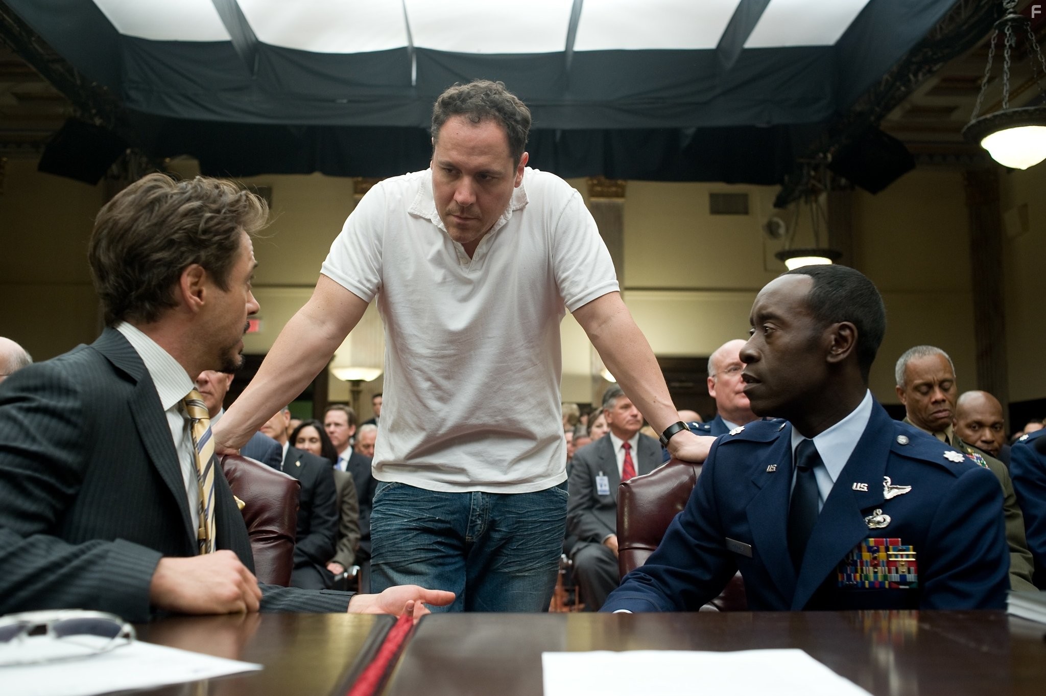 Don Cheadle, Robert Downey Jr., and Jon Favreau in Железный человек 2 (2010)