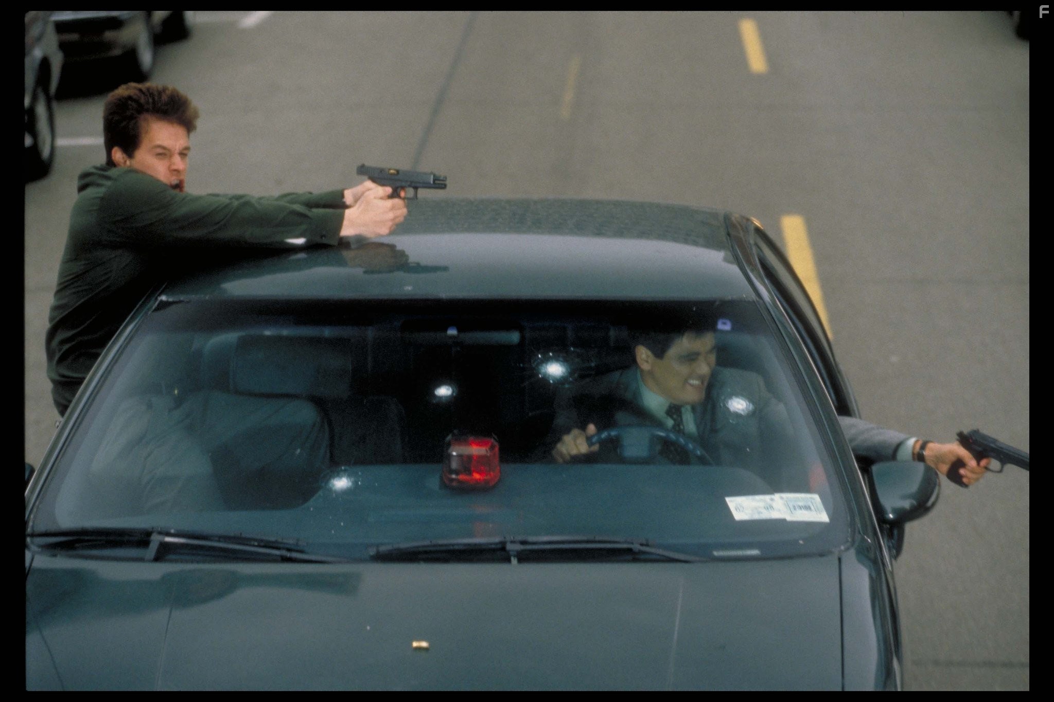 Mark Wahlberg and Yun-Fat Chow in Коррупционер (1999)