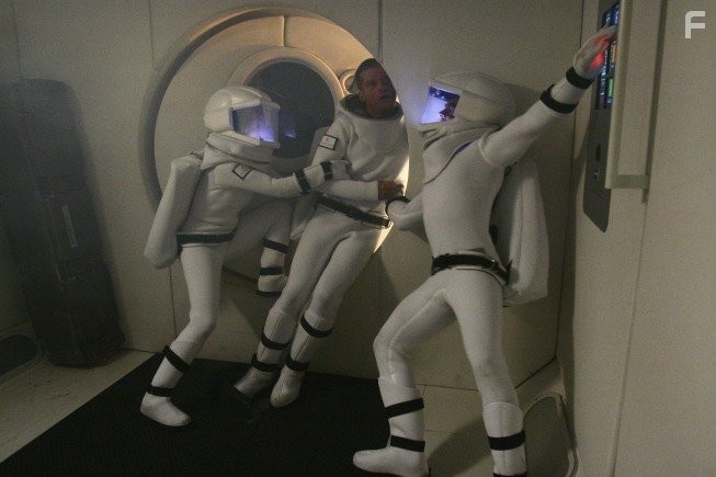 Nikolaj Coster-Waldau, Sienna Guillory, and Gene Farber in Виртуальность (2009)