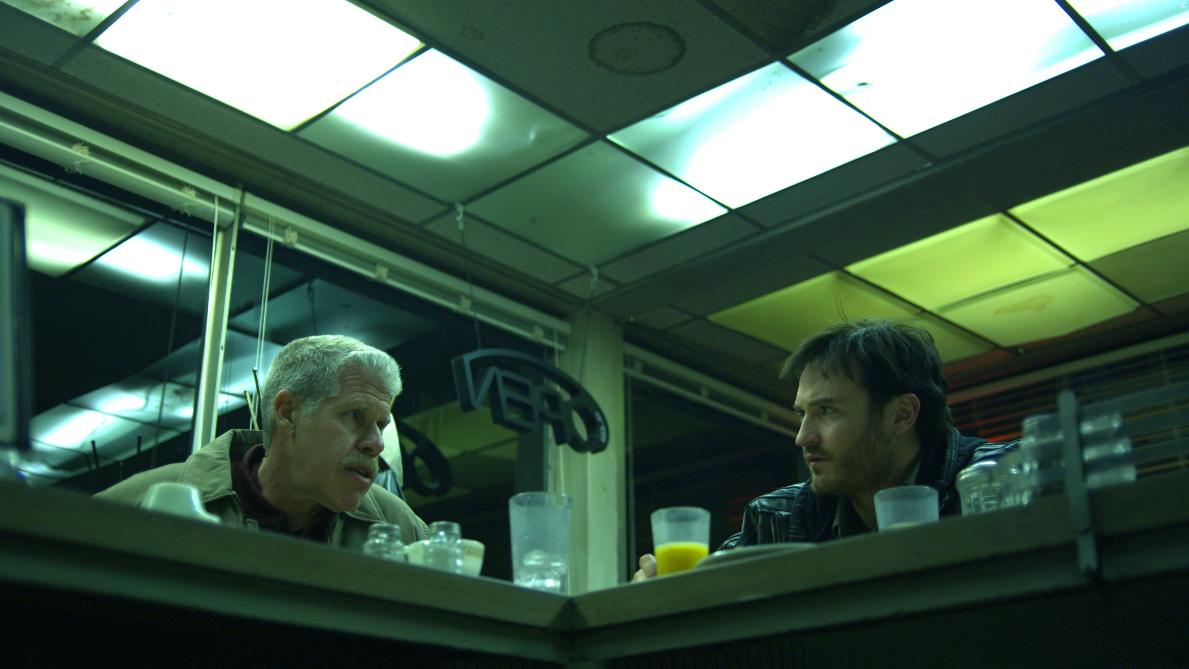 Ron Perlman and Josh Lawson in Crave (2012)