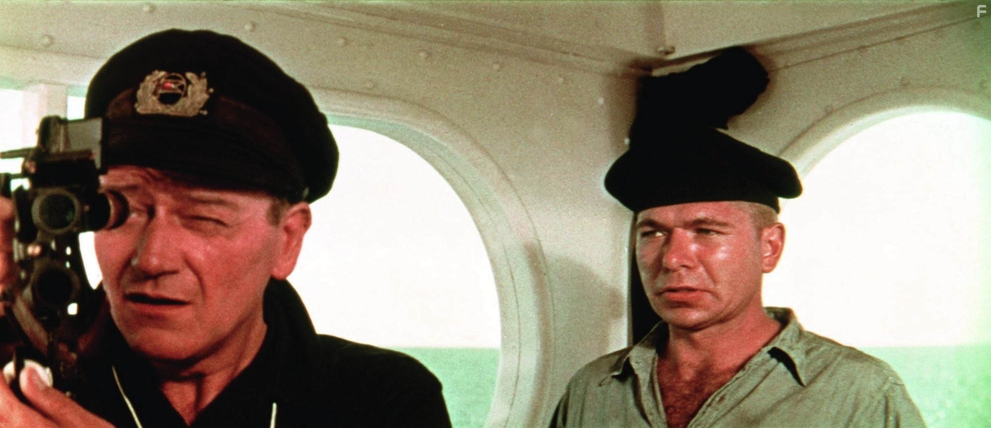 John Wayne and Claude Akins in Морская погоня (1955)