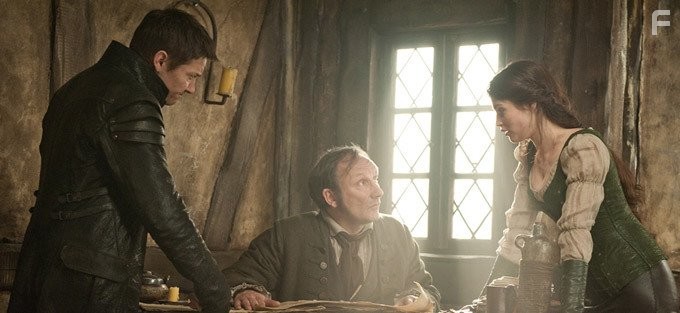 Rainer Bock, Jeremy Renner, and Gemma Arterton in Охотники на ведьм (2013)