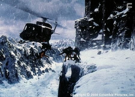 Peter tries to make a dangerous dismount from Major Rasul's helicopter