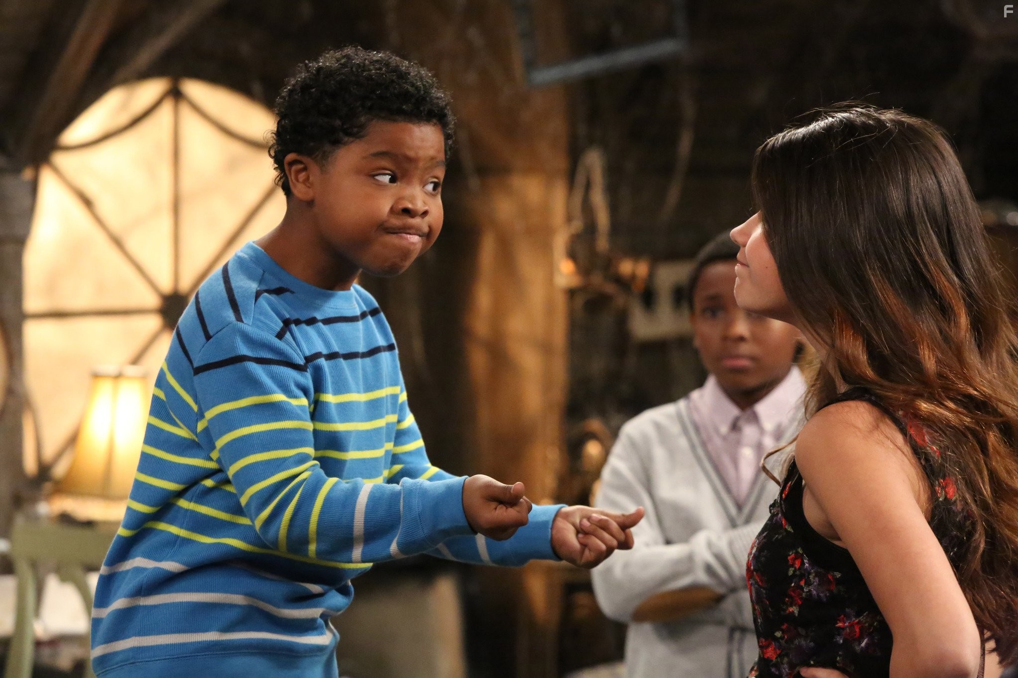 Amber Frank and Benjamin Flores Jr. in Haunted Hathaways (2013)
