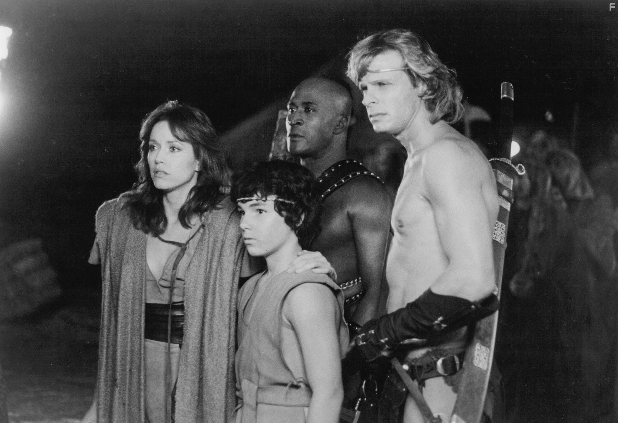Tanya Roberts, Marc Singer, John Amos, and Joshua Milrad in Повелитель зверей (1982)