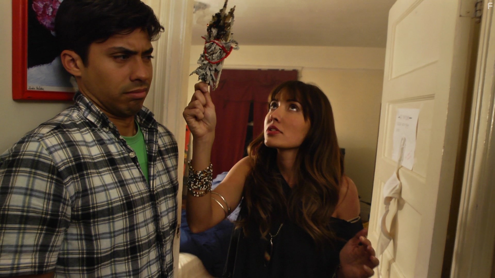 Fernanda Romero and Carlos Santos in Охотники за духами (2013)