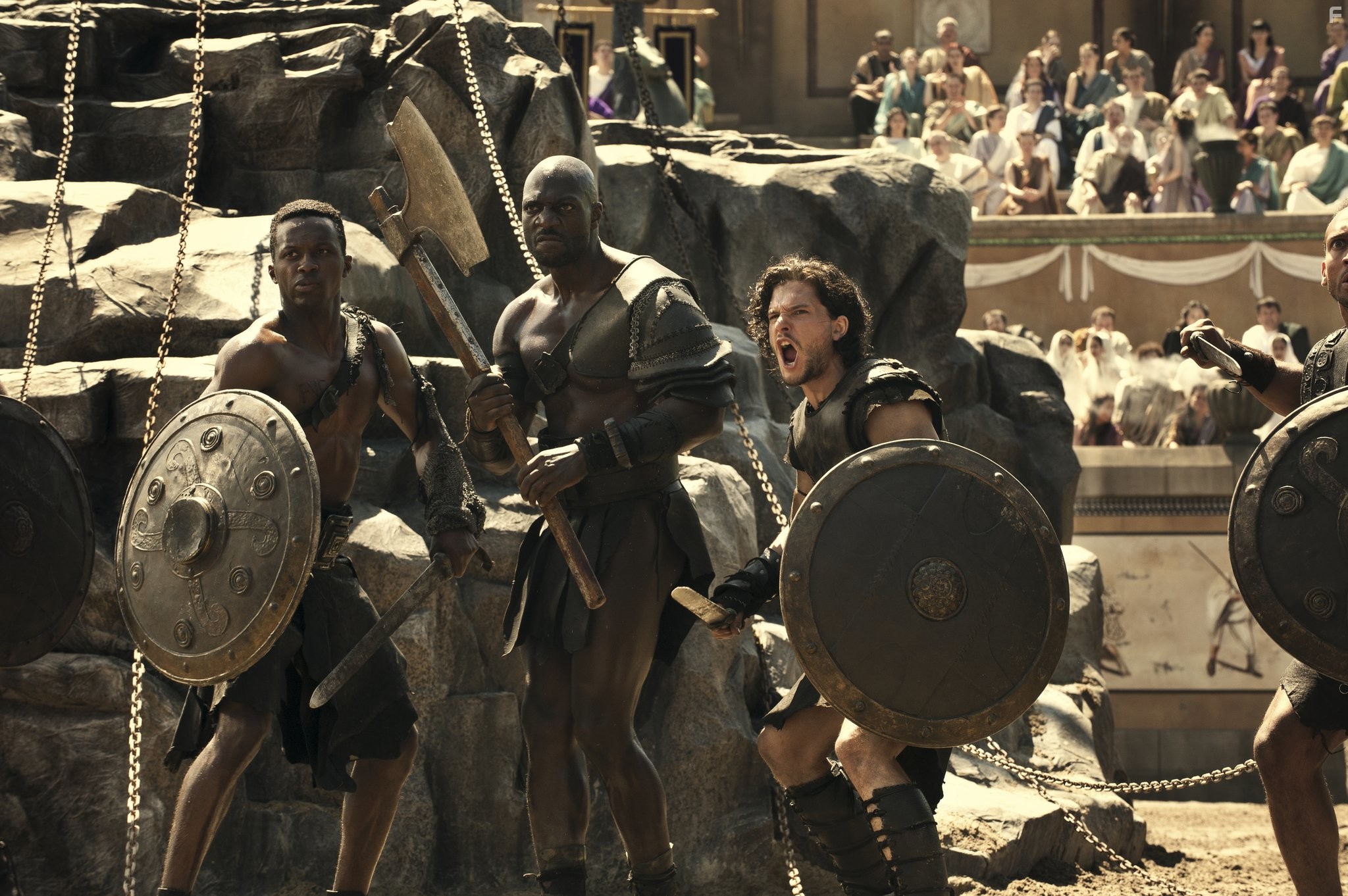Adewale Akinnuoye-Agbaje and Kit Harington in Помпеи (2014)