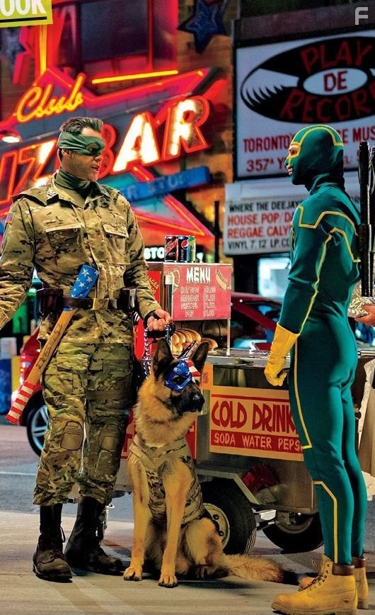 Jim Carrey and Aaron Taylor-Johnson in Пипец 2 (2013)