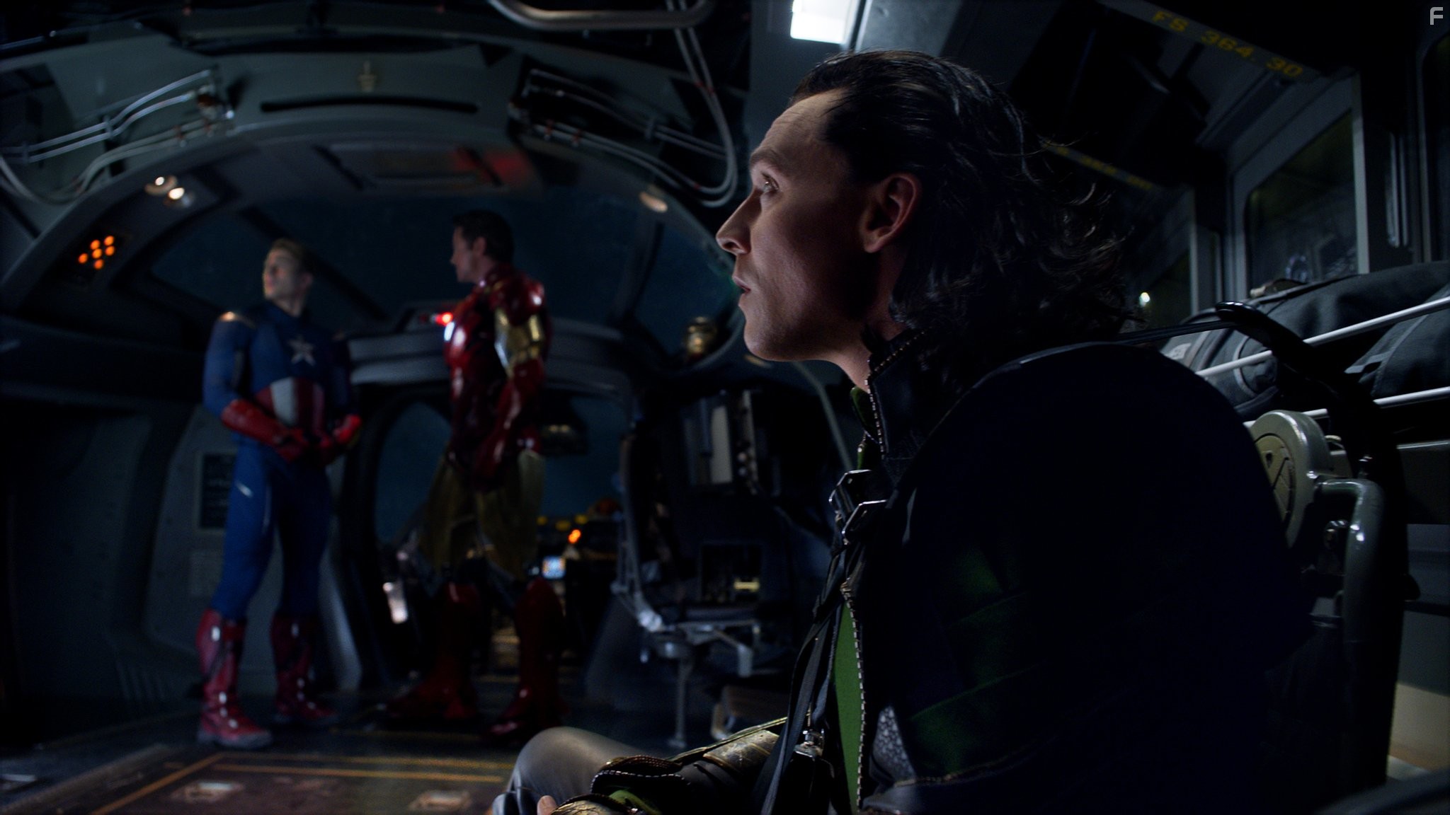 Robert Downey Jr., Chris Evans, Tom Hiddleston, and  in Мстители (2012)