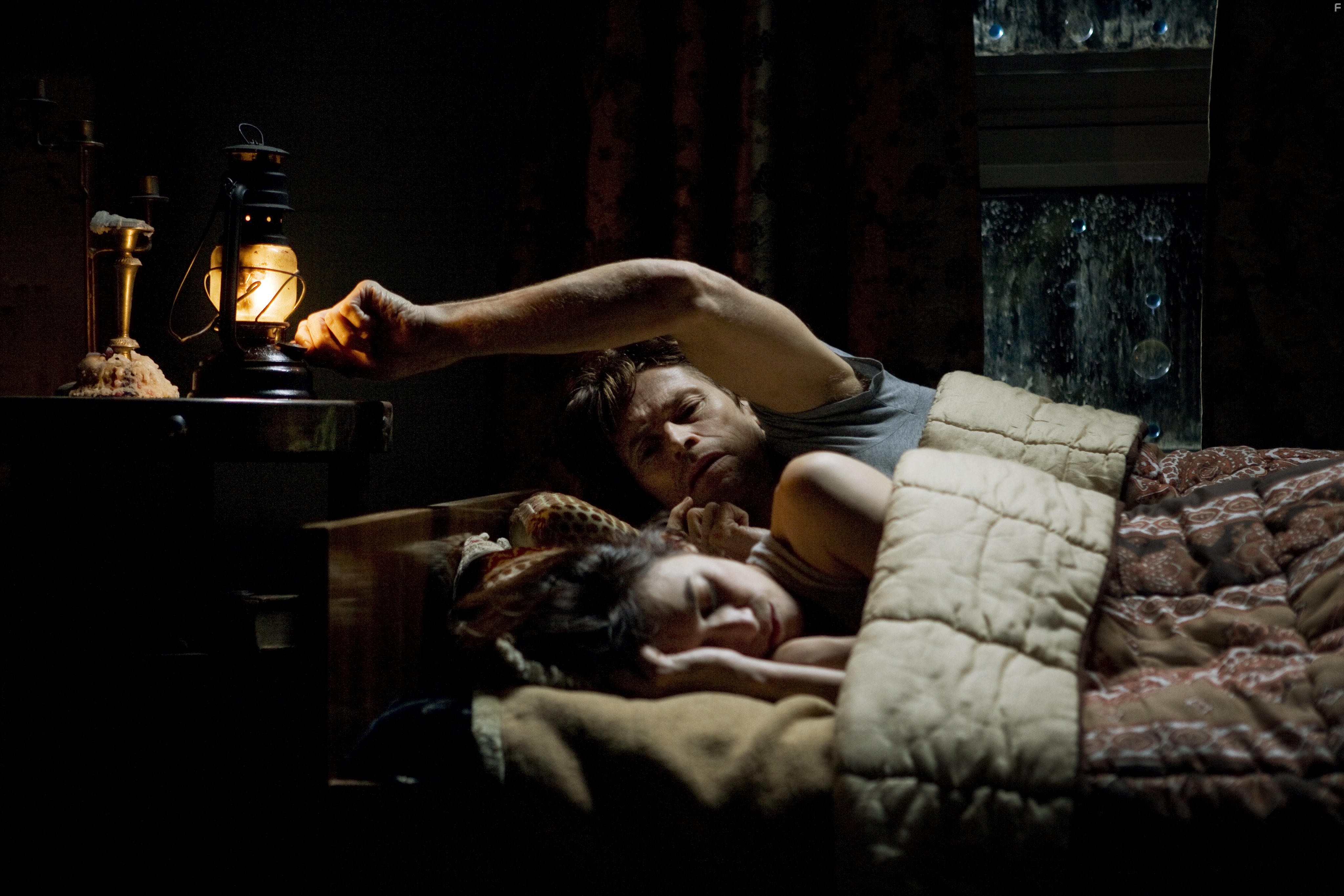 Willem Dafoe and Charlotte Gainsbourg in Антихрист (2009)