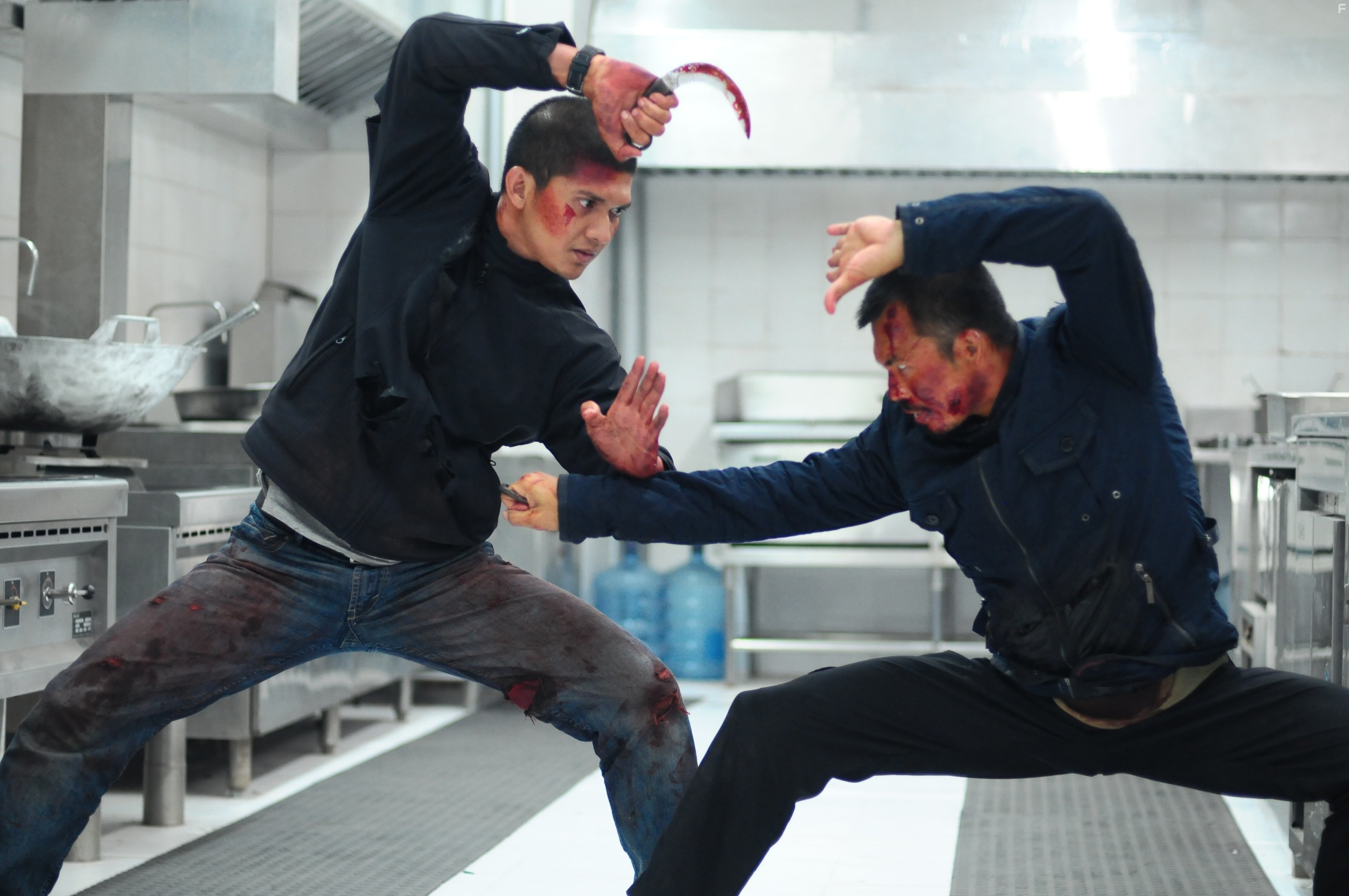 Iko Uwais and Cecep Arif Rahman in Рейд 2 (2014)