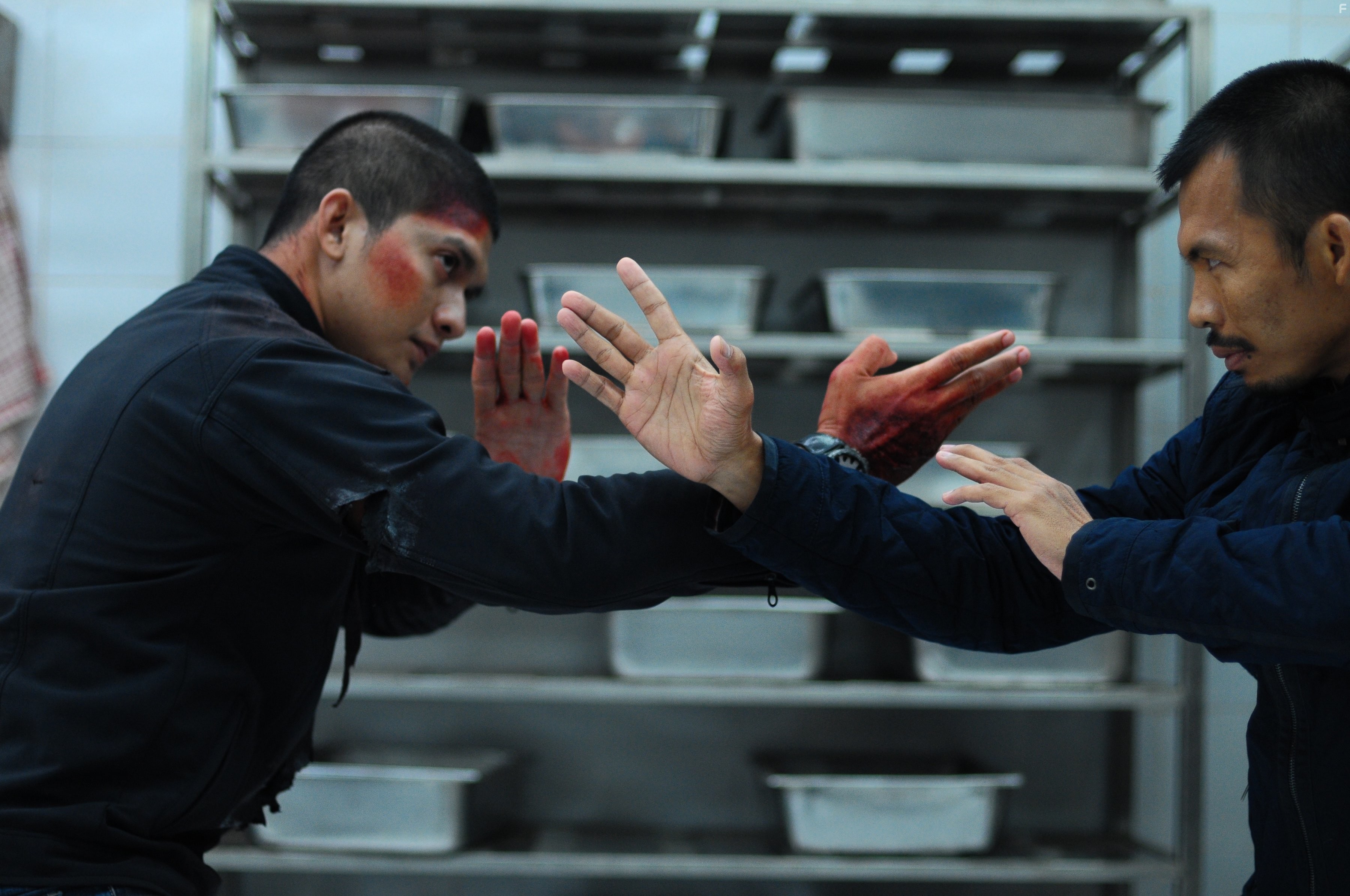 Iko Uwais and Cecep Arif Rahman in Рейд 2 (2014)