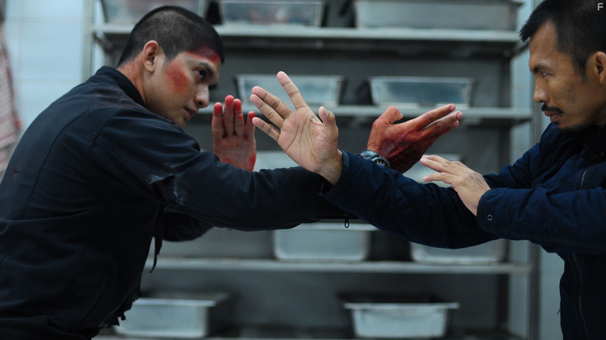 Iko Uwais and Cecep Arif Rahman in Рейд 2 (2014)