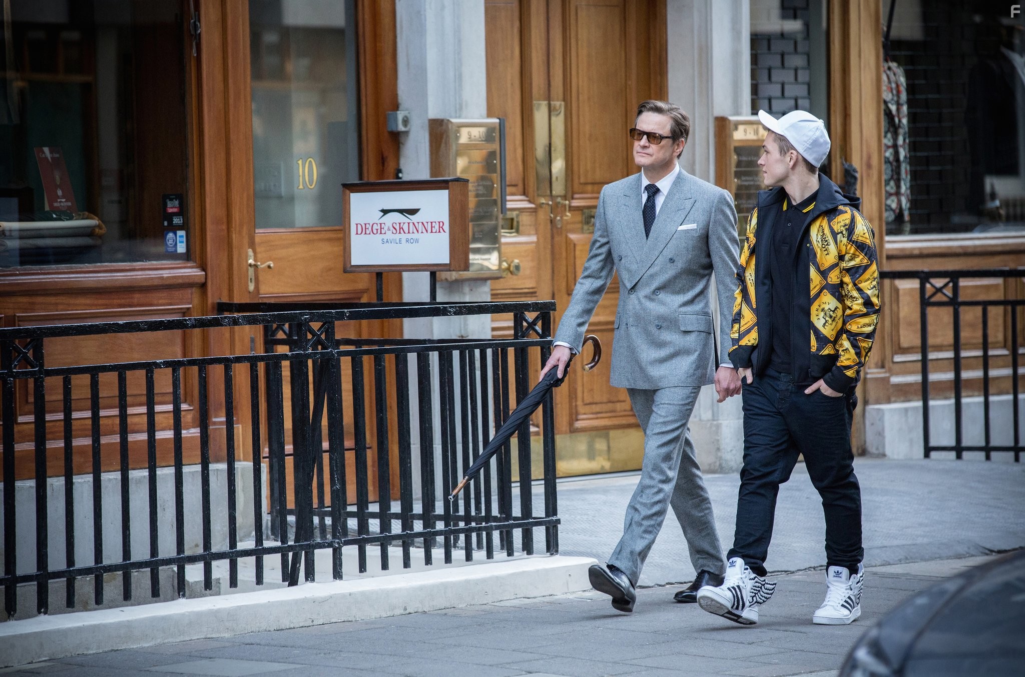 Colin Firth and Taron Egerton in Kingsman: Секретная служба (2014)