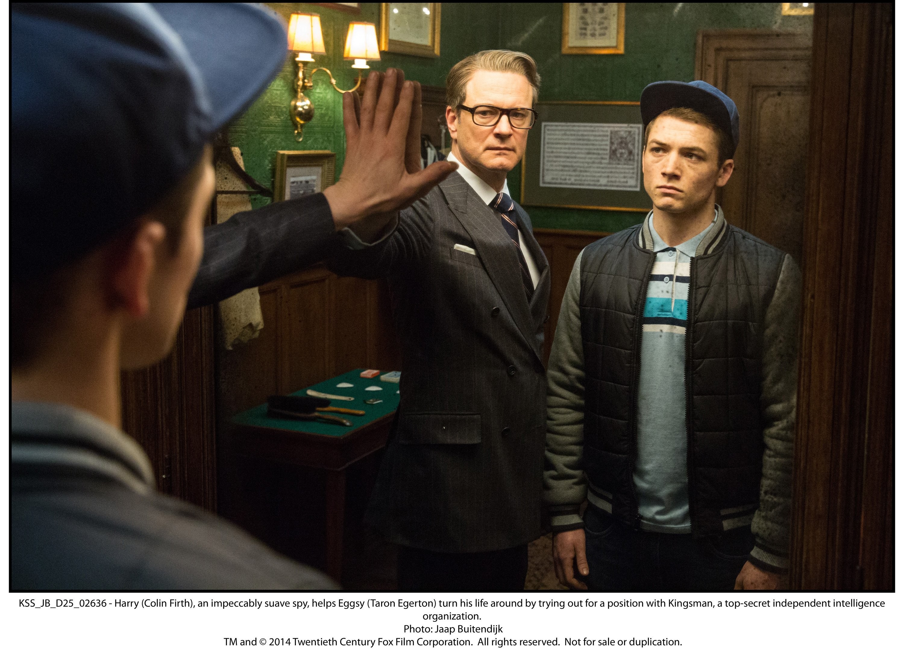 Colin Firth and Taron Egerton in Kingsman: Секретная служба (2014)