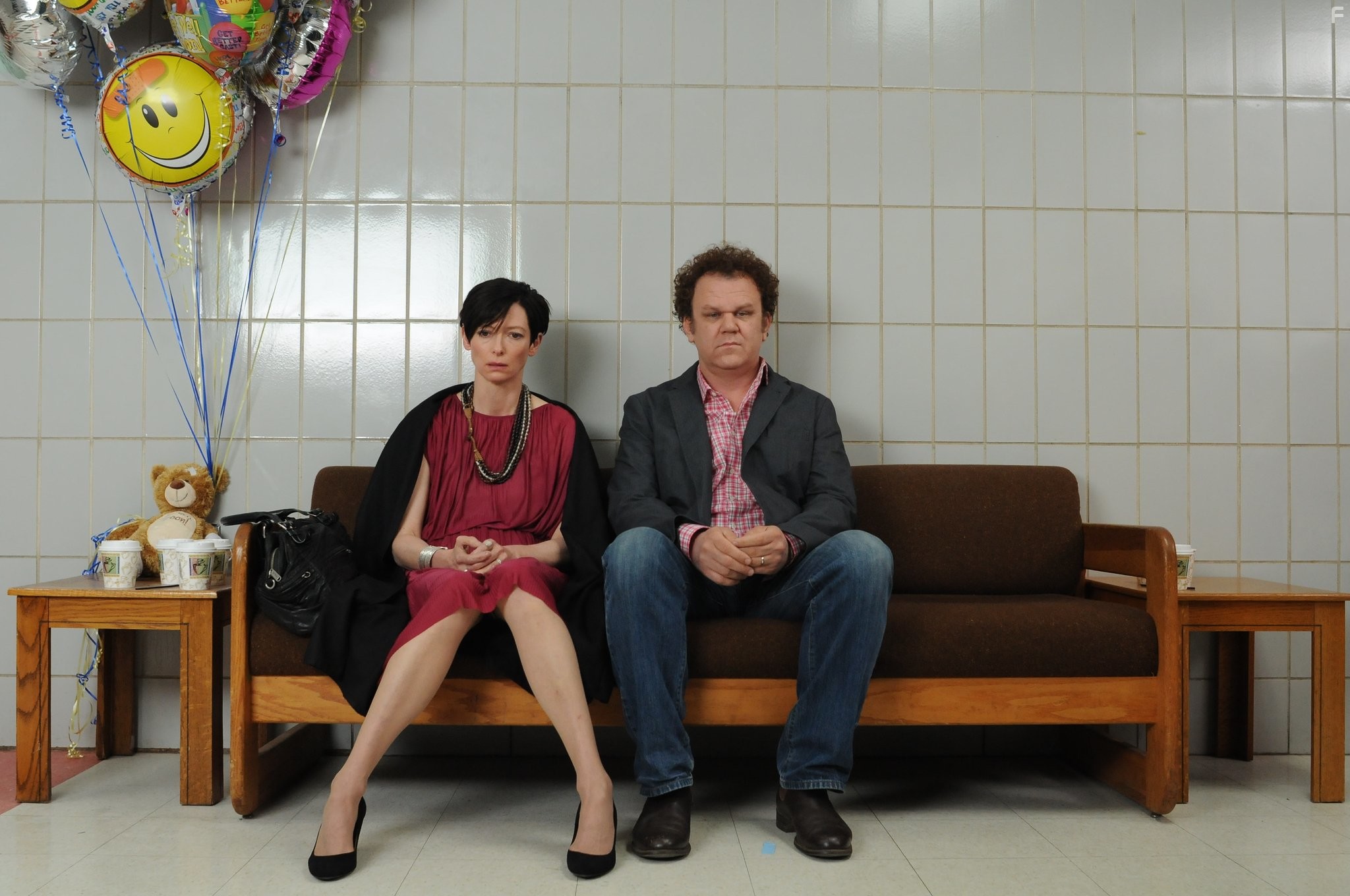 John C. Reilly and Tilda Swinton in Что-то не так с Кевином (2011)