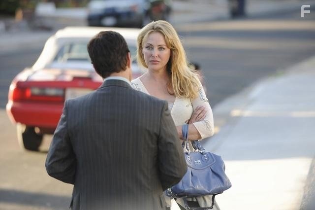 Virginia Madsen and Carlos Bernard in Scoundrels (2010)
