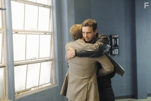 David James Elliott and Patrick John Flueger in Scoundrels (2010)