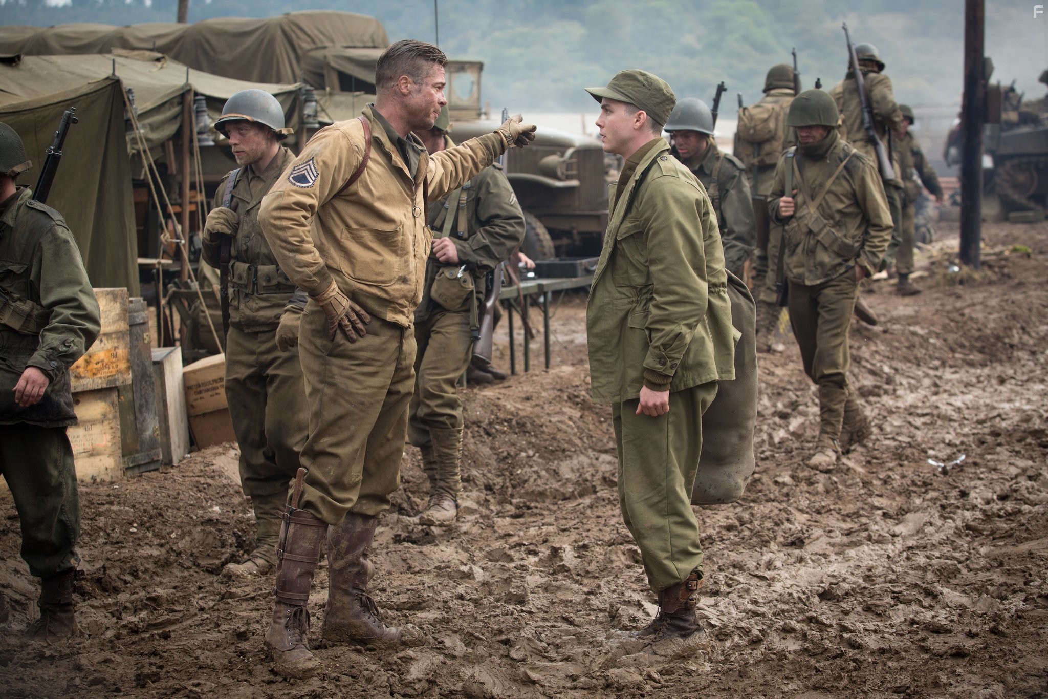 Brad Pitt and Logan Lerman in Ярость (2014)