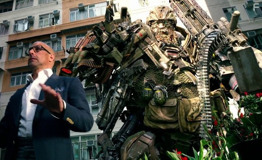 John Goodman and Stanley Tucci in Трансформеры: Эпоха истребления (2014)