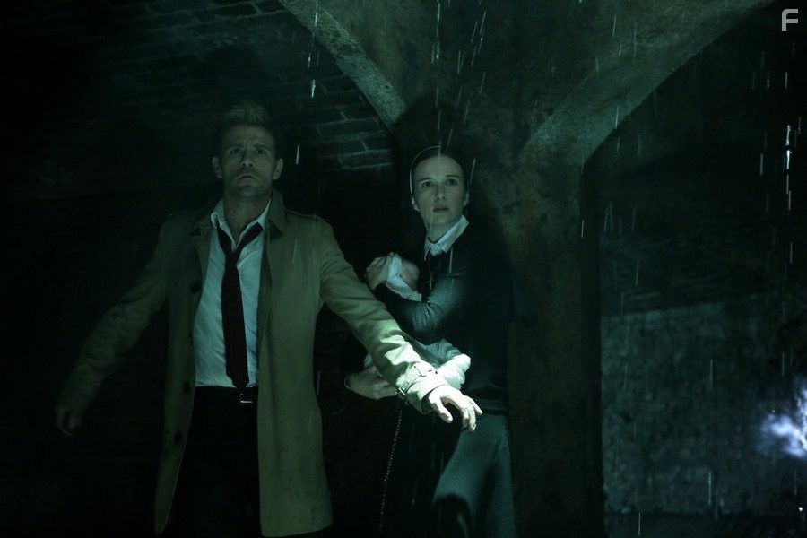 Matt Ryan and Claire van der Boom in Константин (2014)