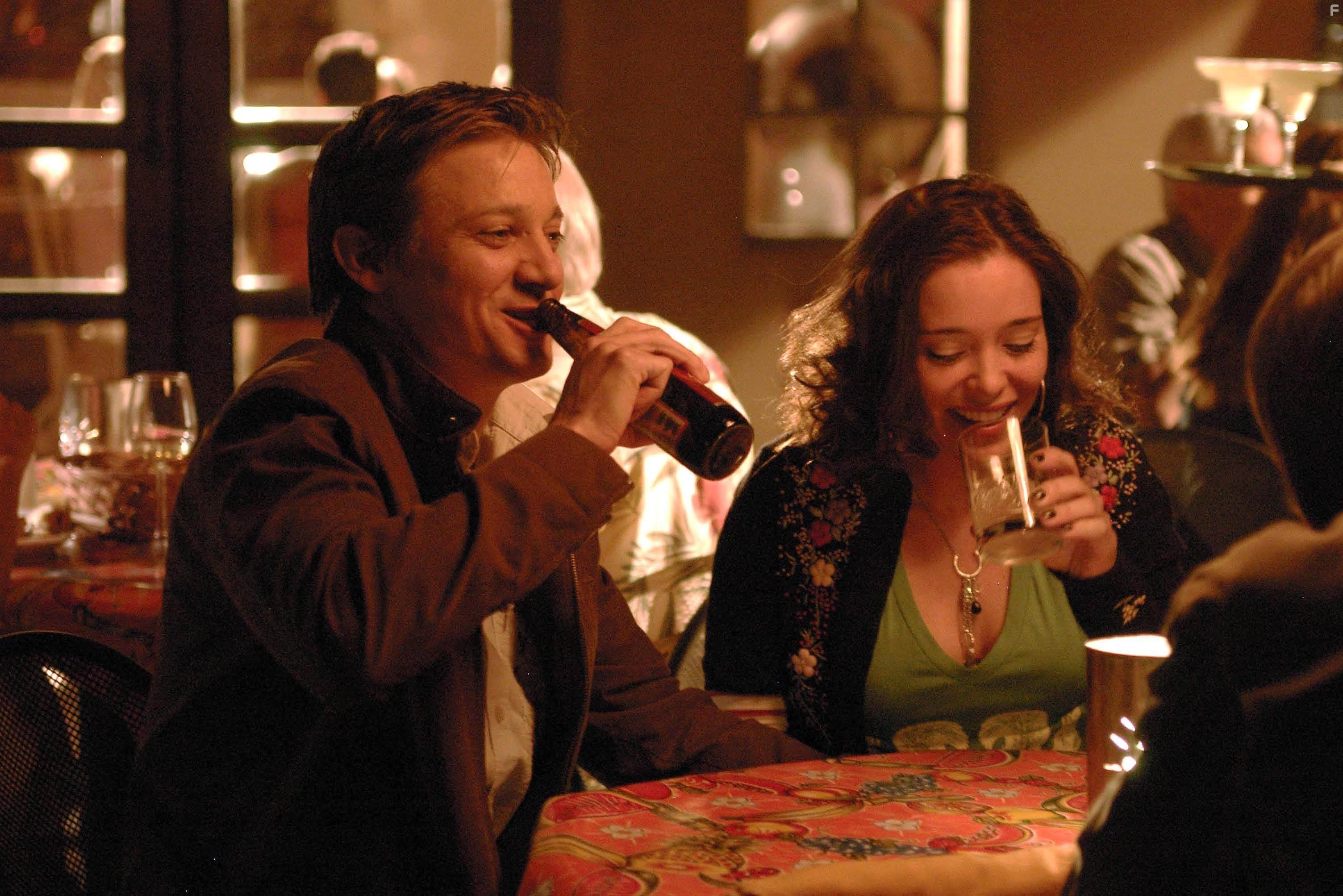 Jeremy Renner (Sam) and Marguerite Moreau (Cinda) at bar