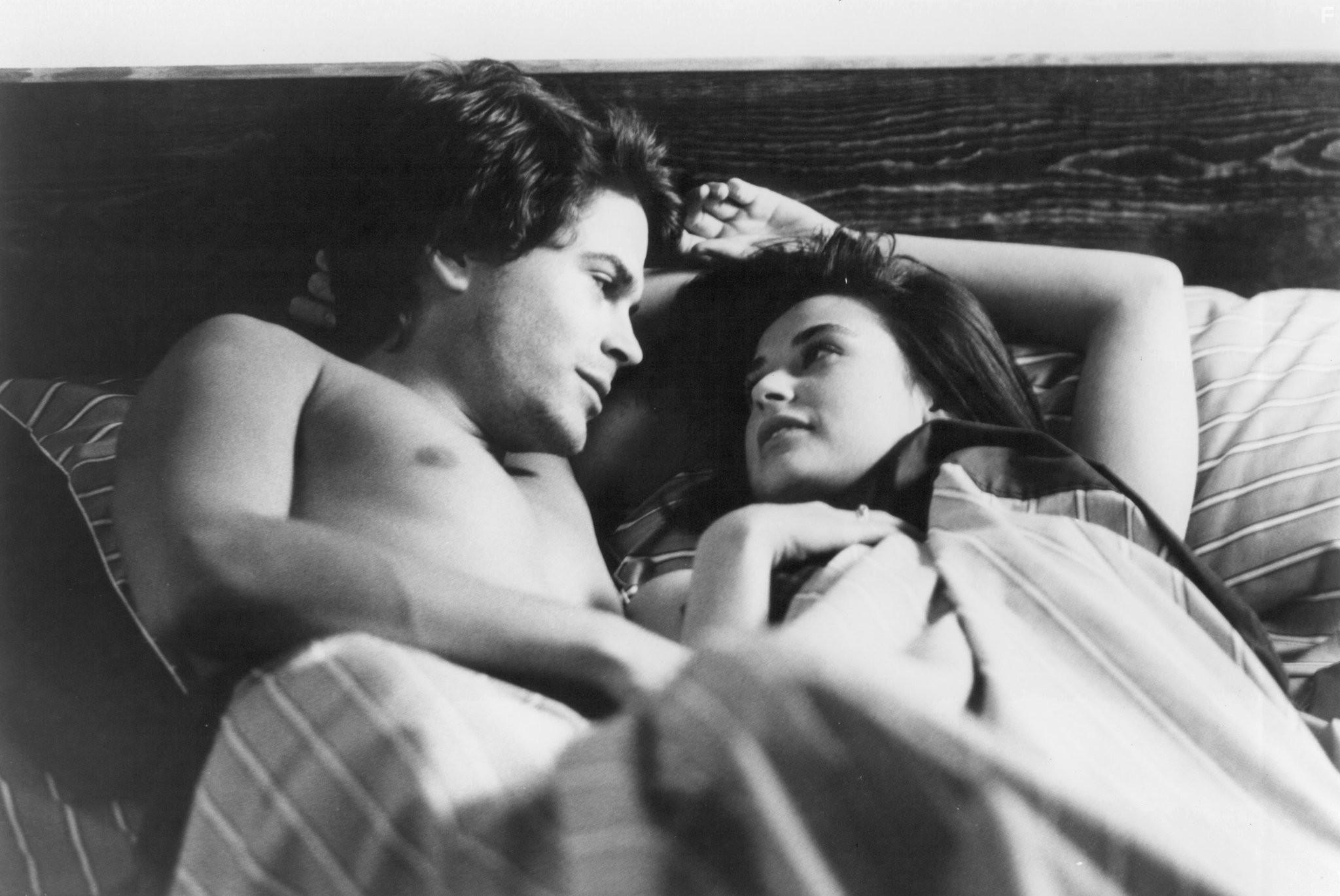 Demi Moore and Rob Lowe in Чтo случилось прошлой ночью (1986)