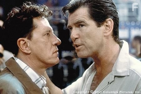Harry Pendel (Geoffrey Rush, left), a Cockney ex-con turned popular tailor to the rich and powerful of Panama, is preyed upon by ruthless, charming British spy Osnard (Pierce Brosnan)