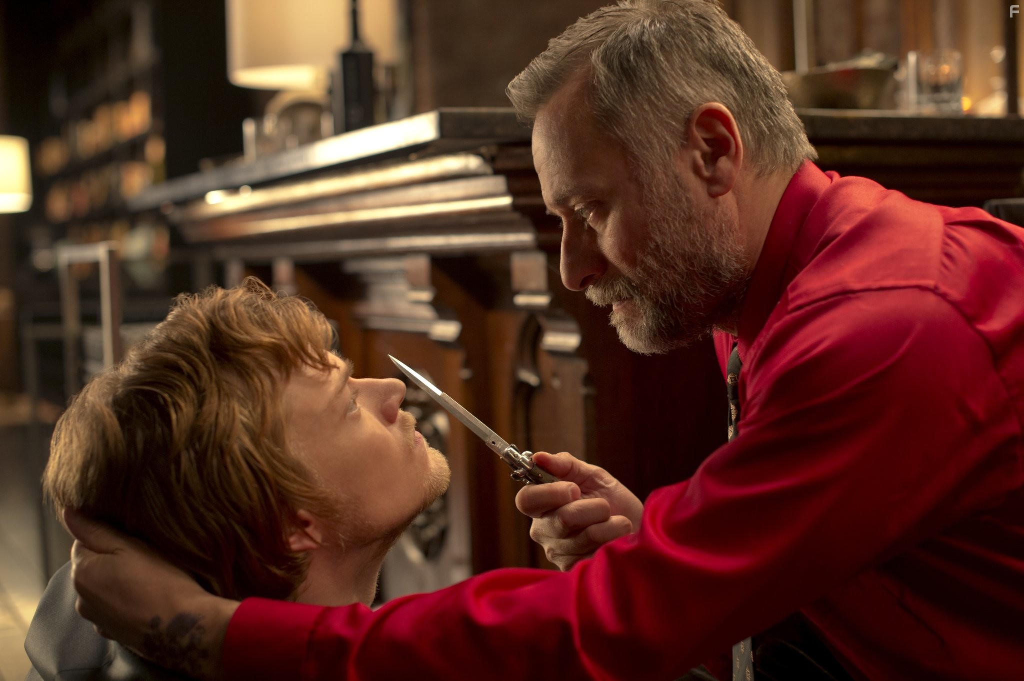 Michael Nyqvist and Alfie Allen in Джон Уик (2014)