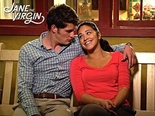 Gina Rodriguez and Brett Dier in Девственница Джейн (2014)
